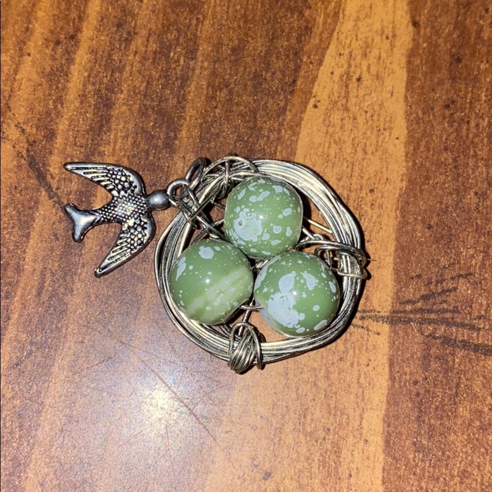 Birdsnest and sparrow charm